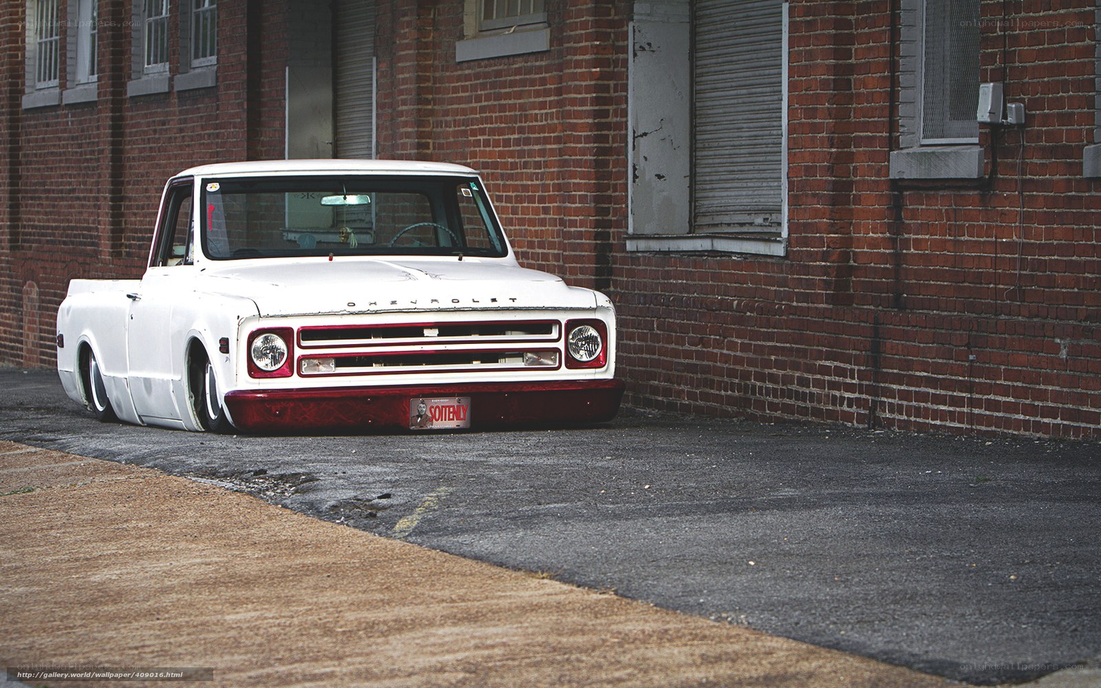 white classic truck in alley