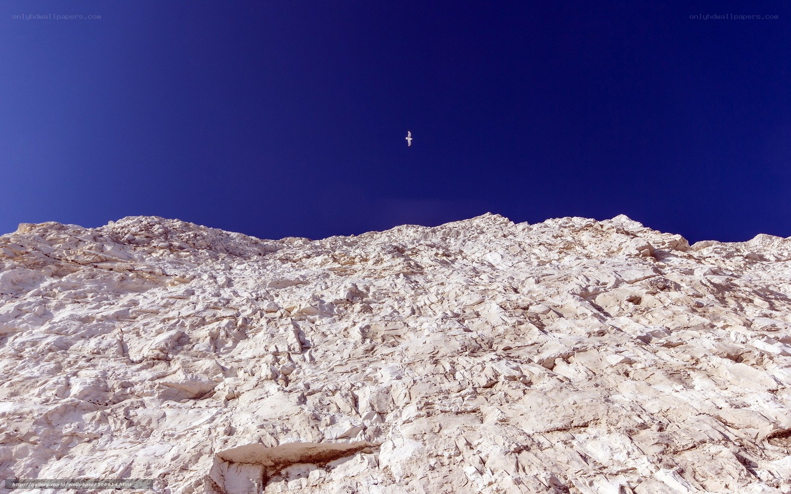 White cliff under blue sky