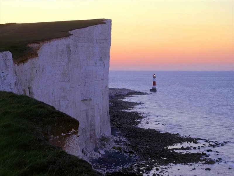 White Cliffs and Lighthouse — Serene, Sunset