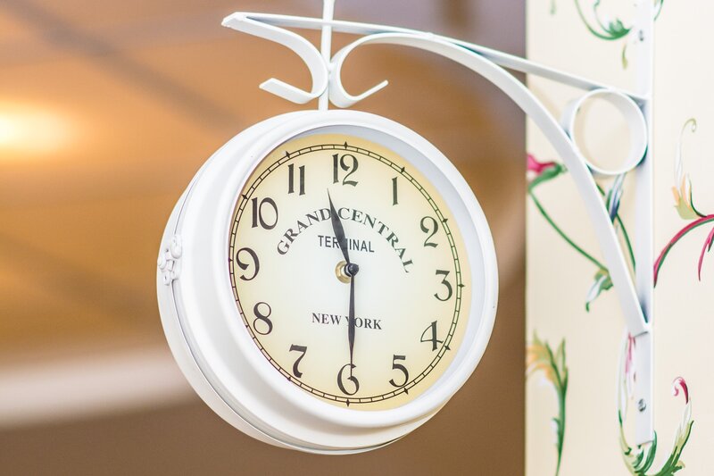 White Clock on Bracket