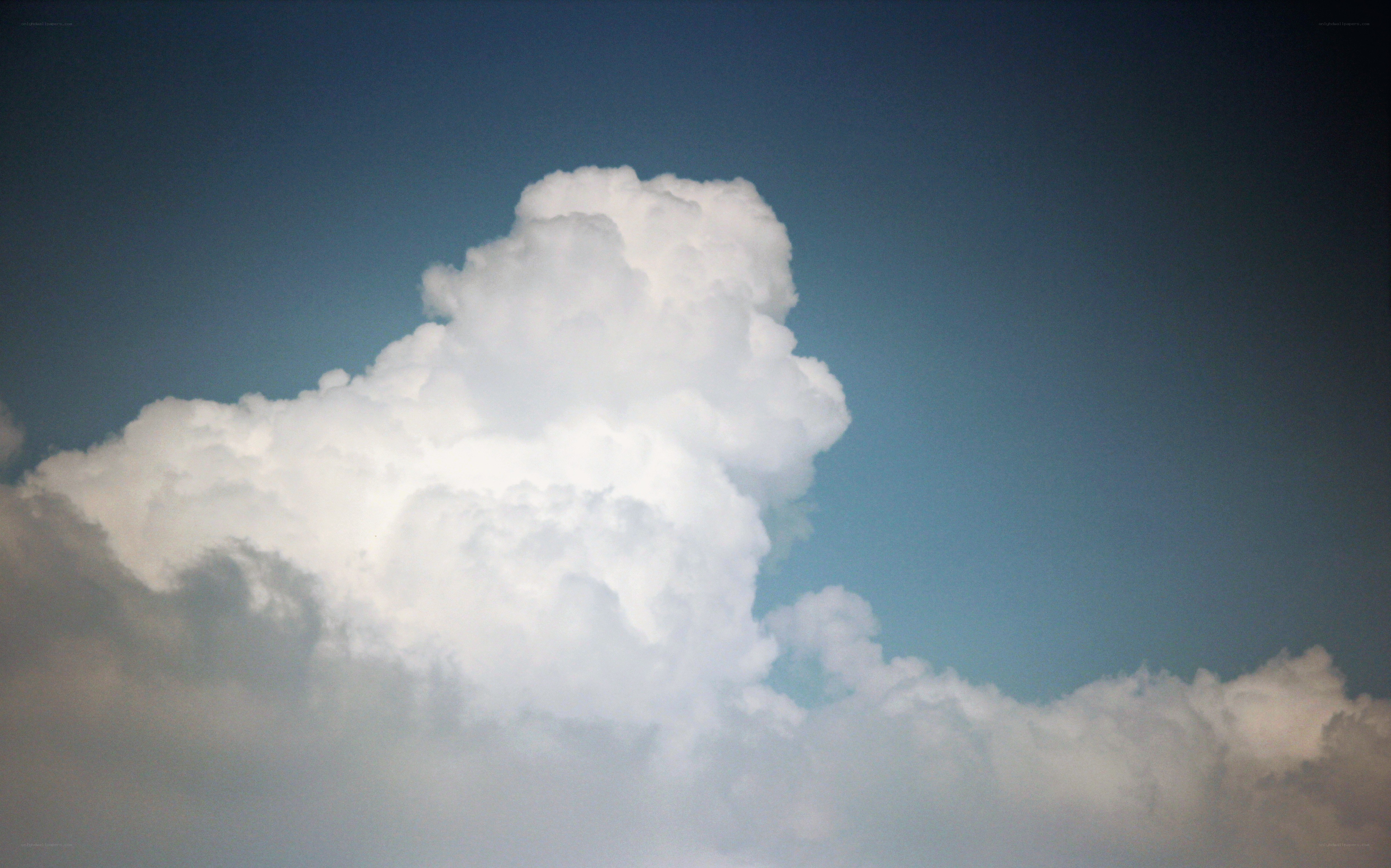 white cloud in blue sky