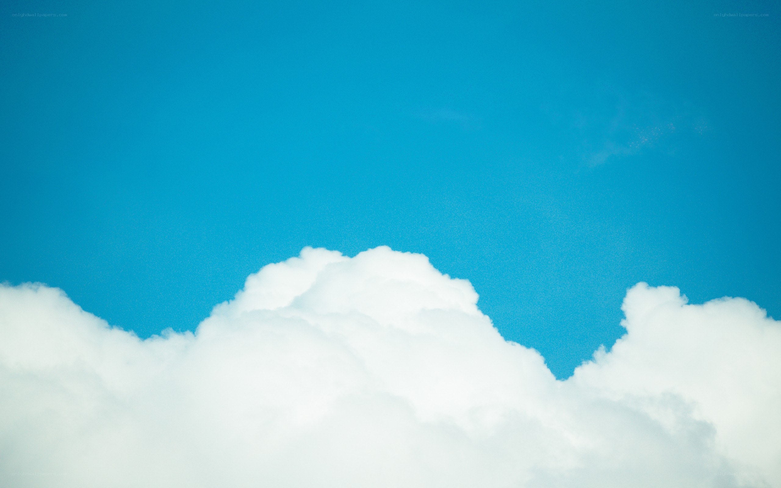 white clouds against blue sky