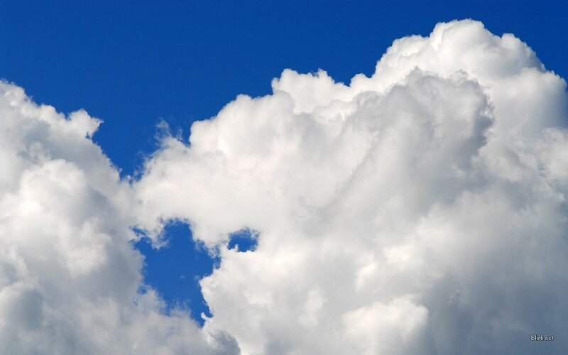 white clouds against blue sky