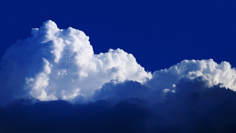 White clouds against blue sky
