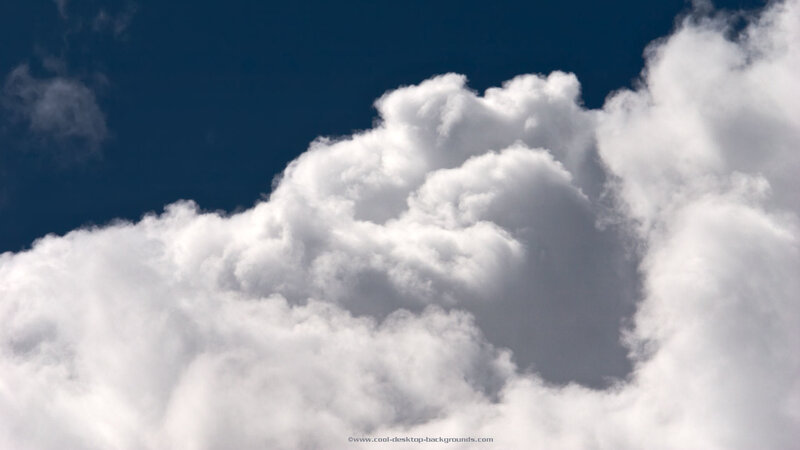 white clouds against blue sky