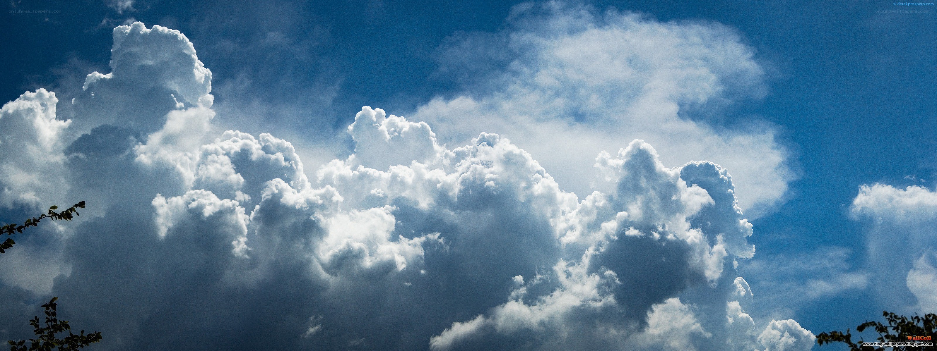 White clouds against blue sky