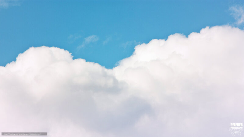 White clouds against blue sky