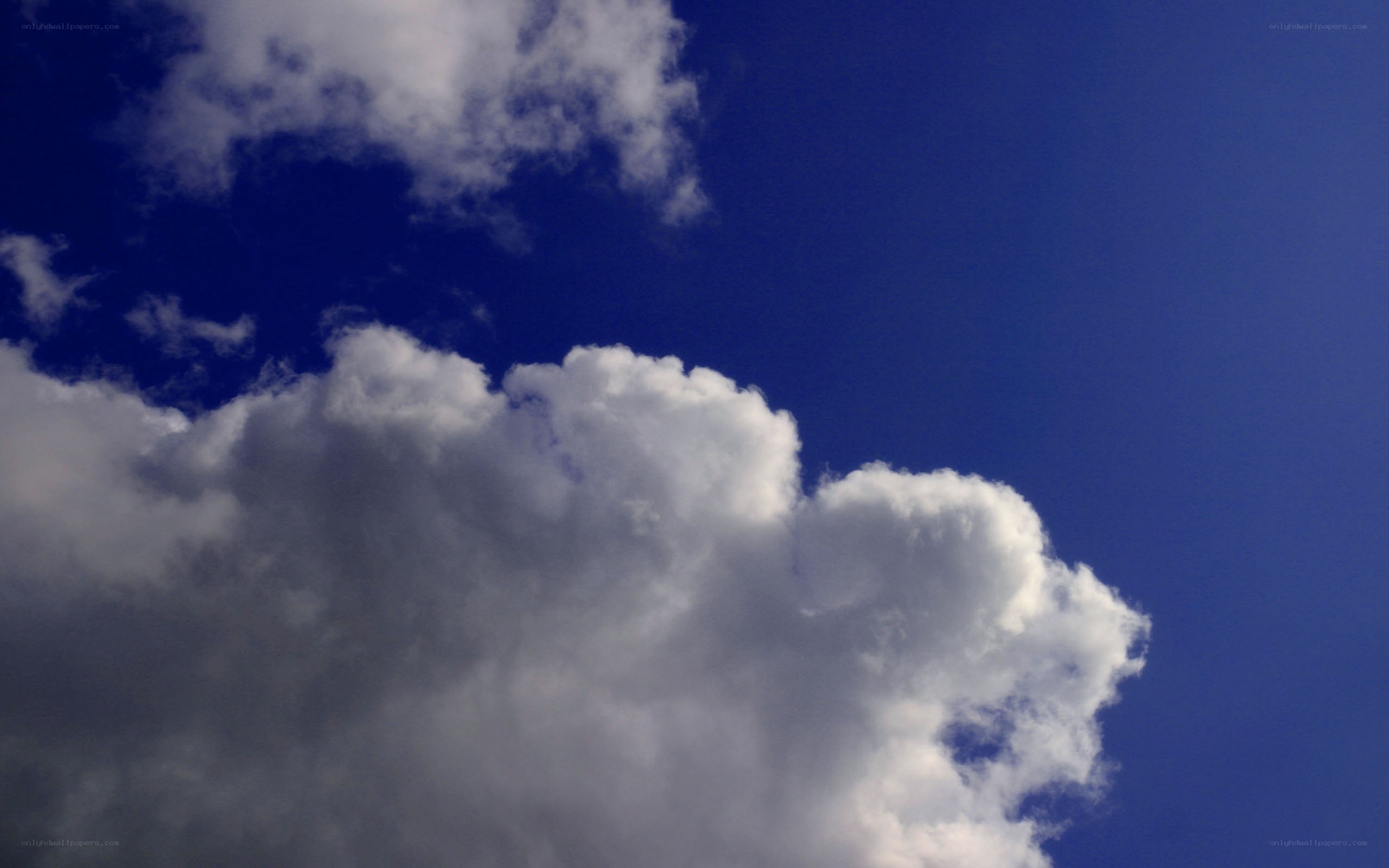 white clouds in blue sky