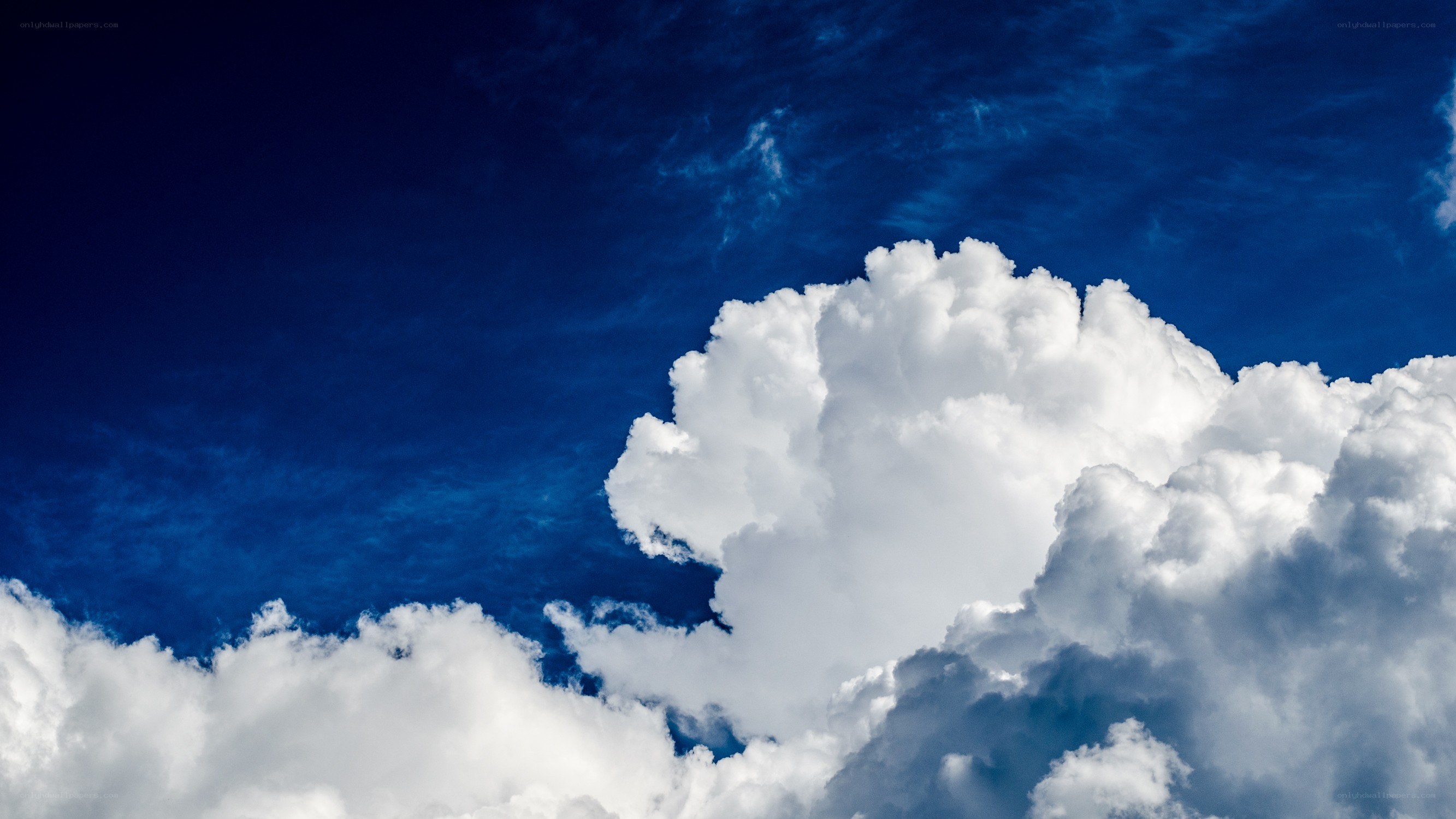 white clouds in blue sky