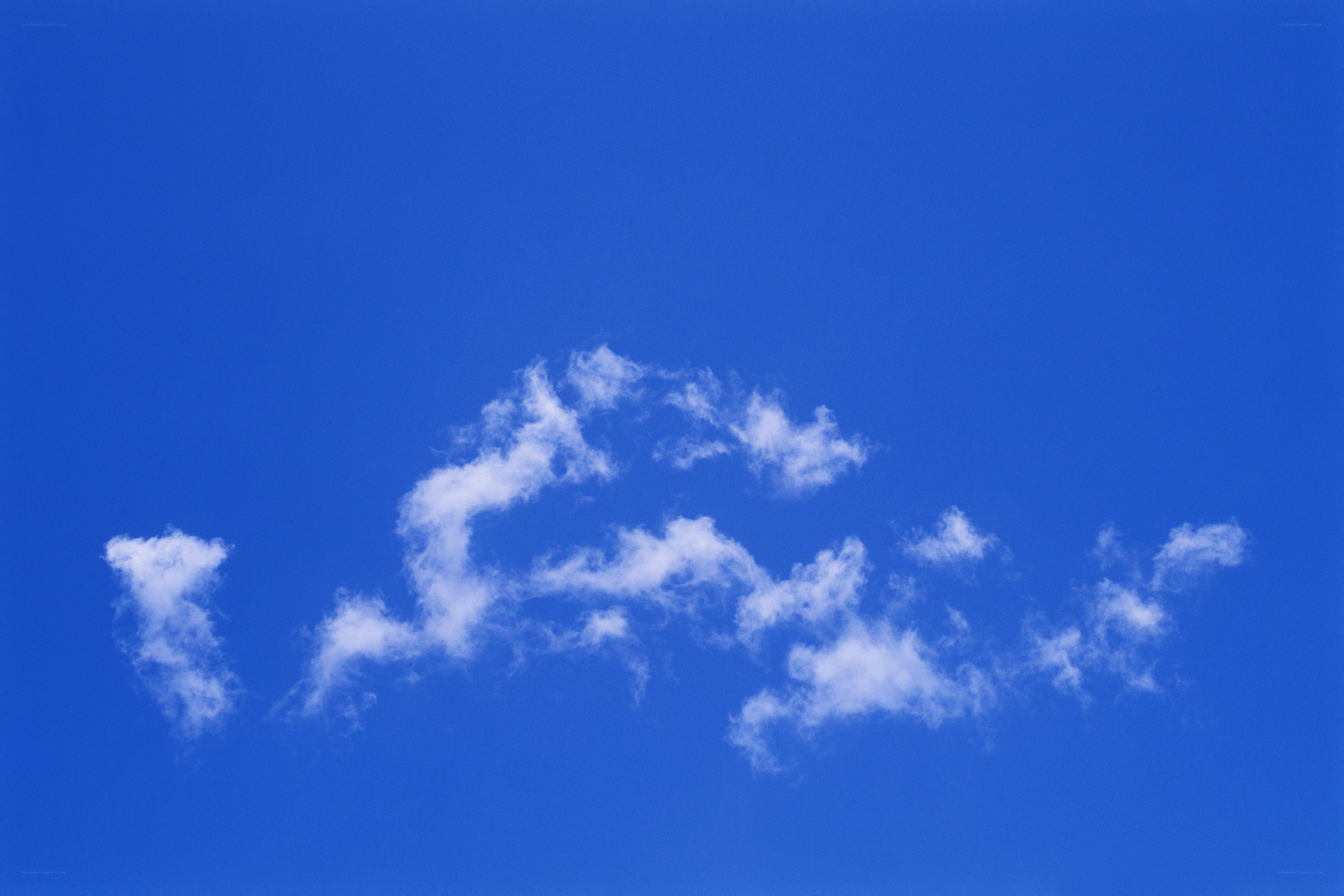 white clouds in blue sky