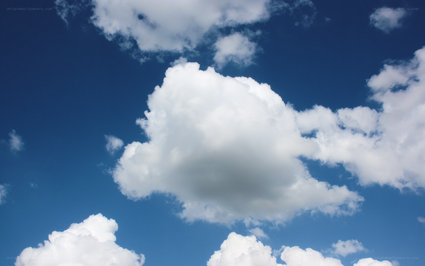 white clouds in blue sky
