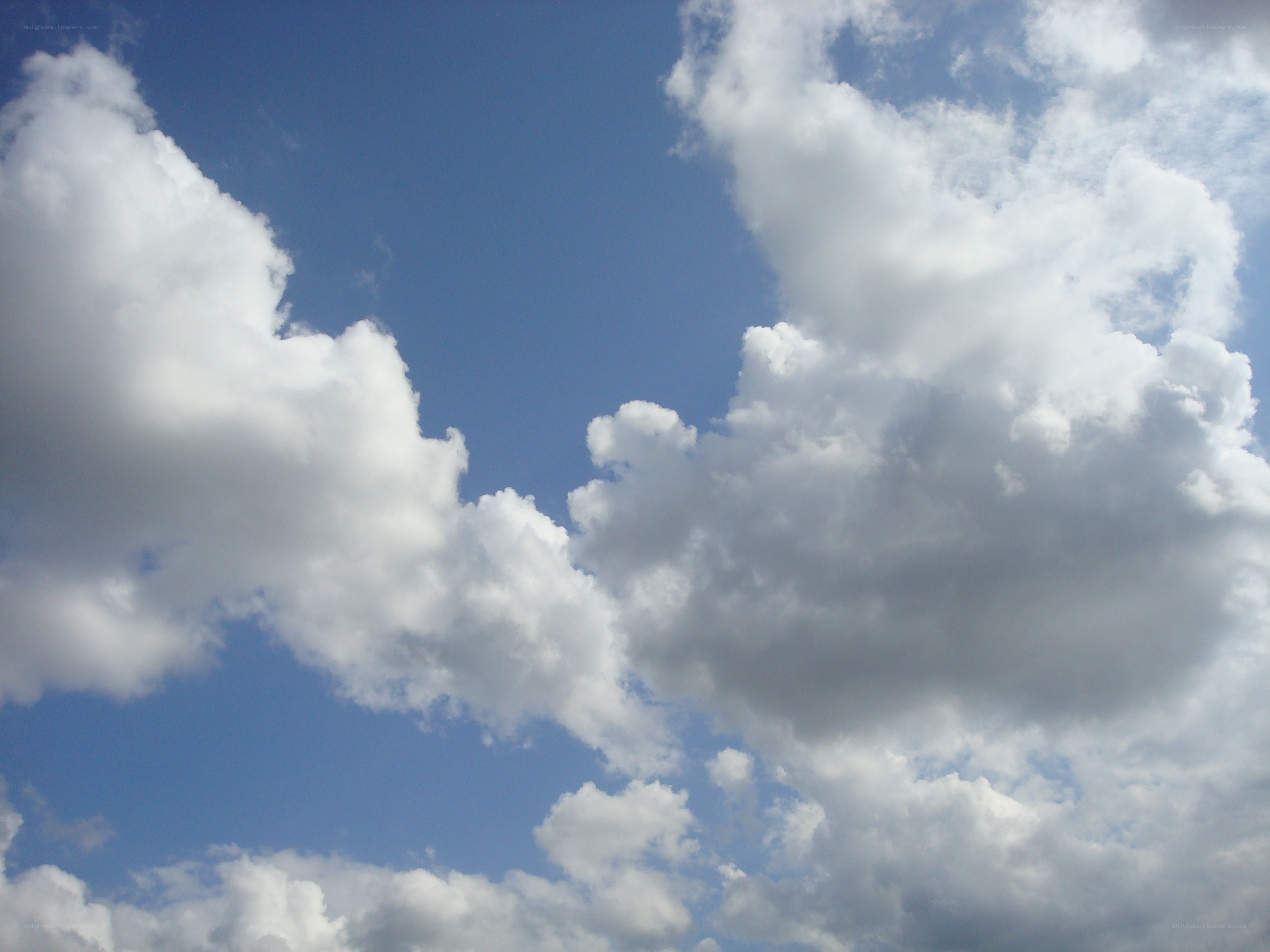 white clouds in blue sky