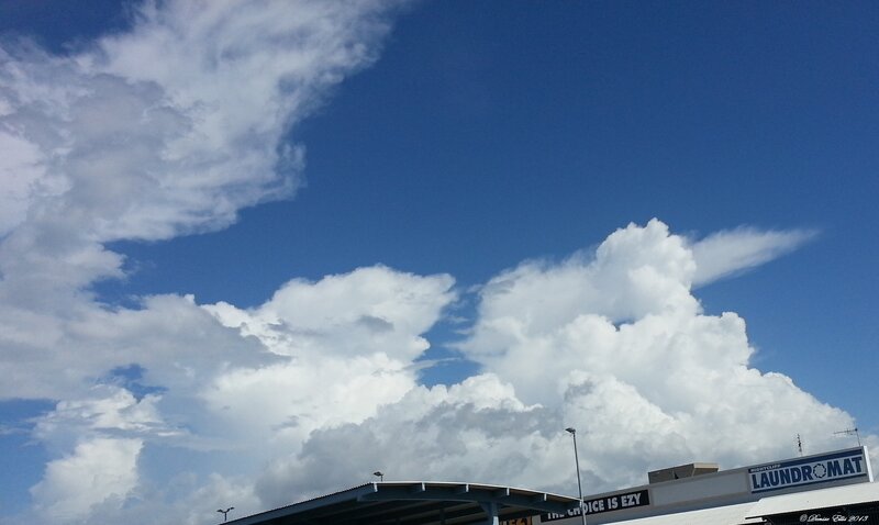 White Clouds in Blue Sky — Dramatic, Afternoon, Photograph, Building