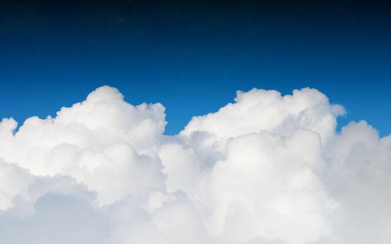 White Clouds in Blue Sky — Serene, Daytime