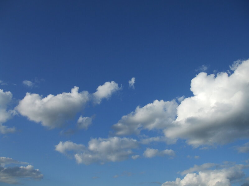 White Clouds in Blue Sky — Serene