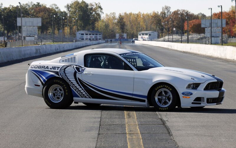 white cobra jet mustang on track
