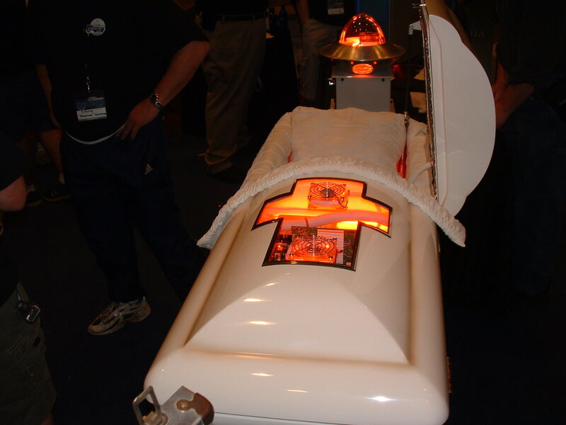 white coffin with glowing interior