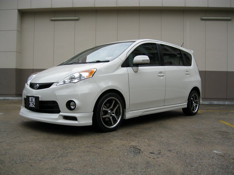 white compact car
