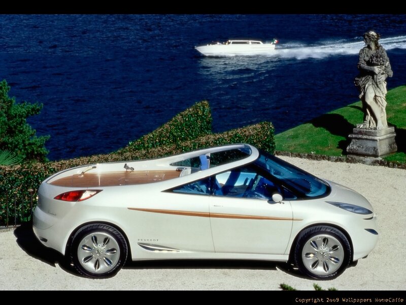 White concept car by lake
