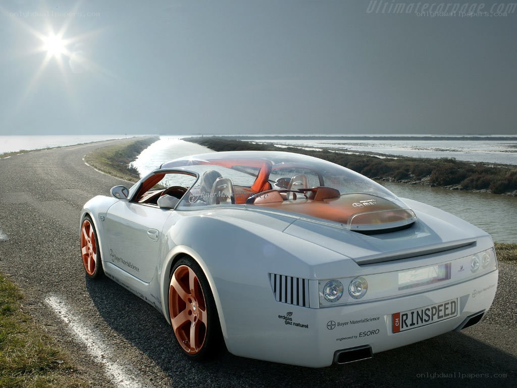 white concept car on coastal road