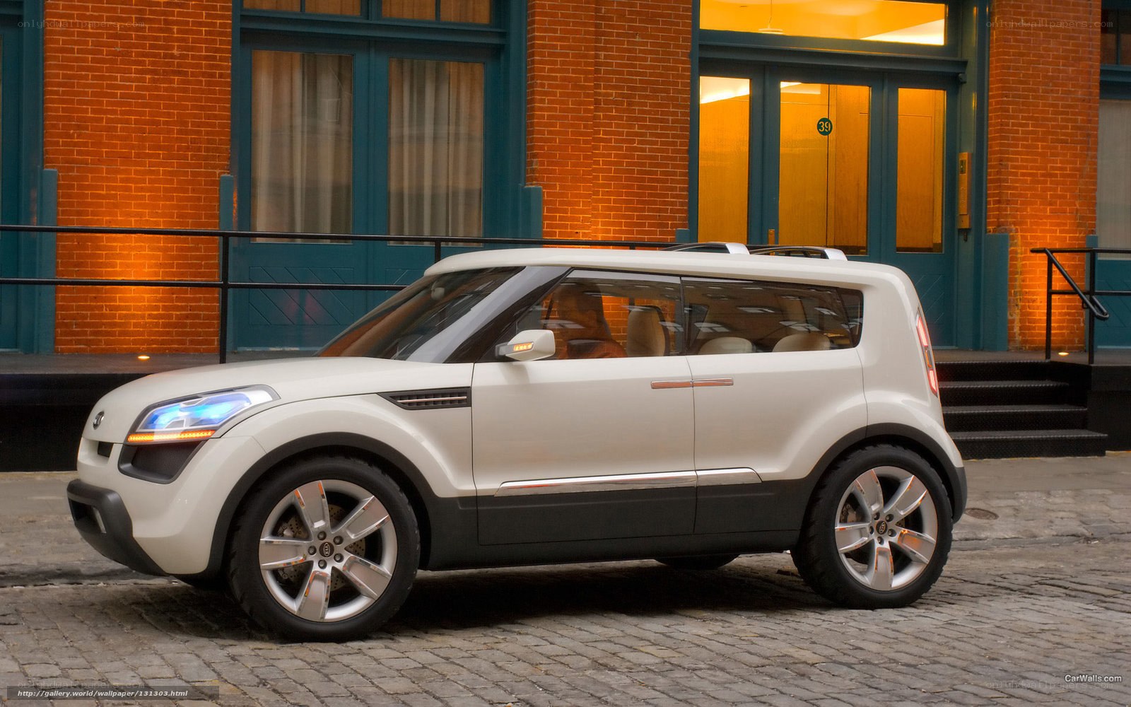 White concept car on cobblestone