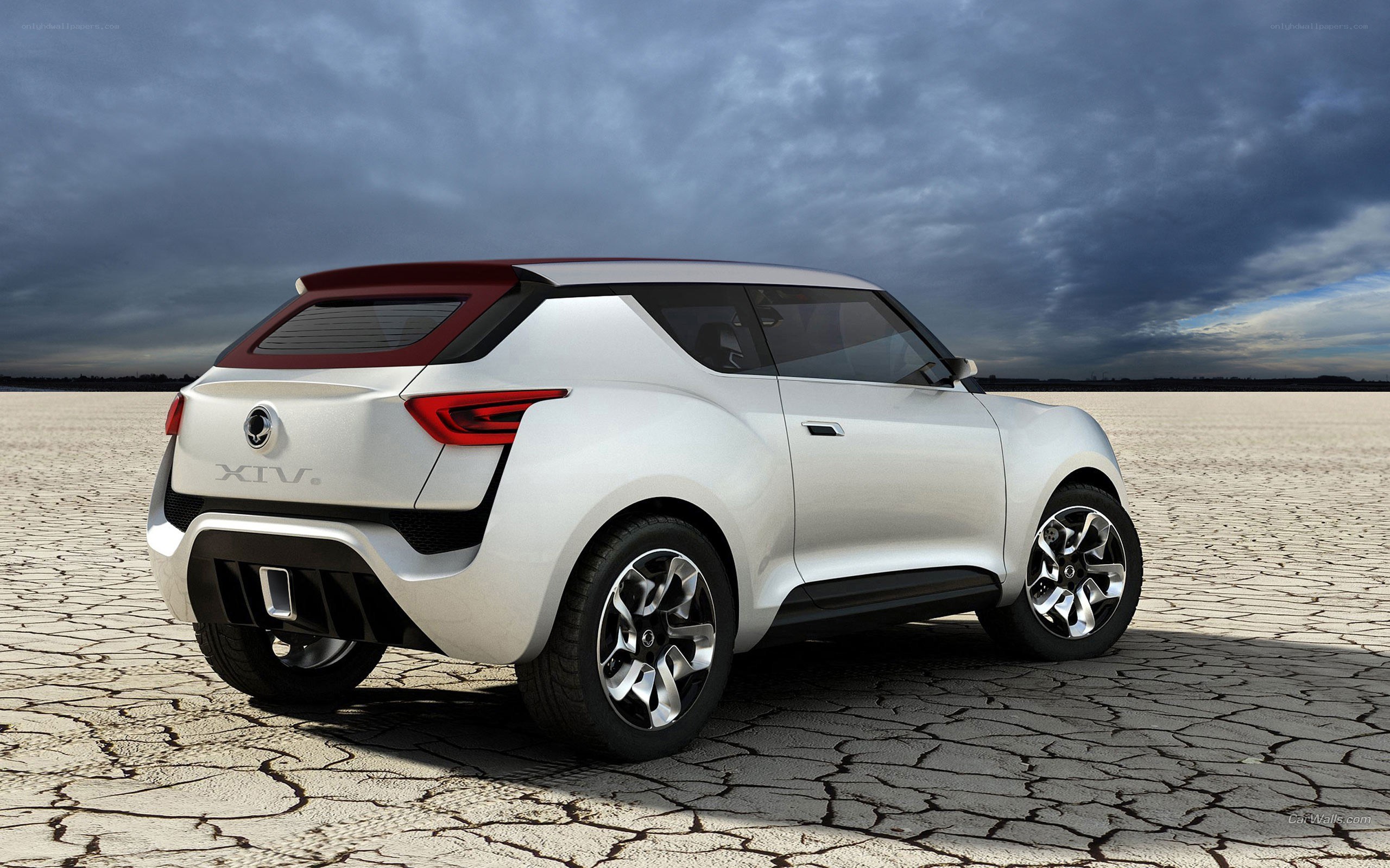 white concept car on cracked ground