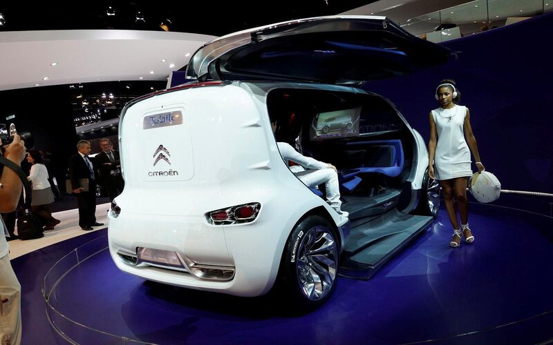 White Concept Car — Showroom, Night