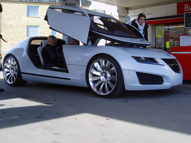 White concept car with gull-wing doors