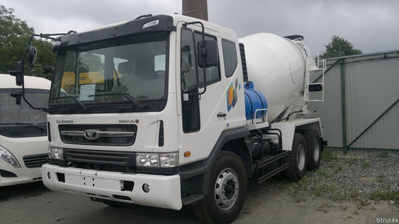 White Concrete Mixer Truck — Overcast