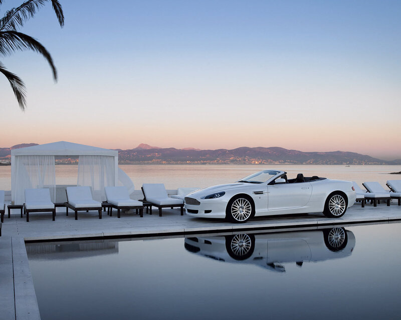 White convertible by the pool