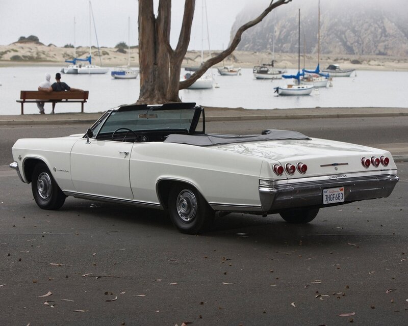 White convertible by the water