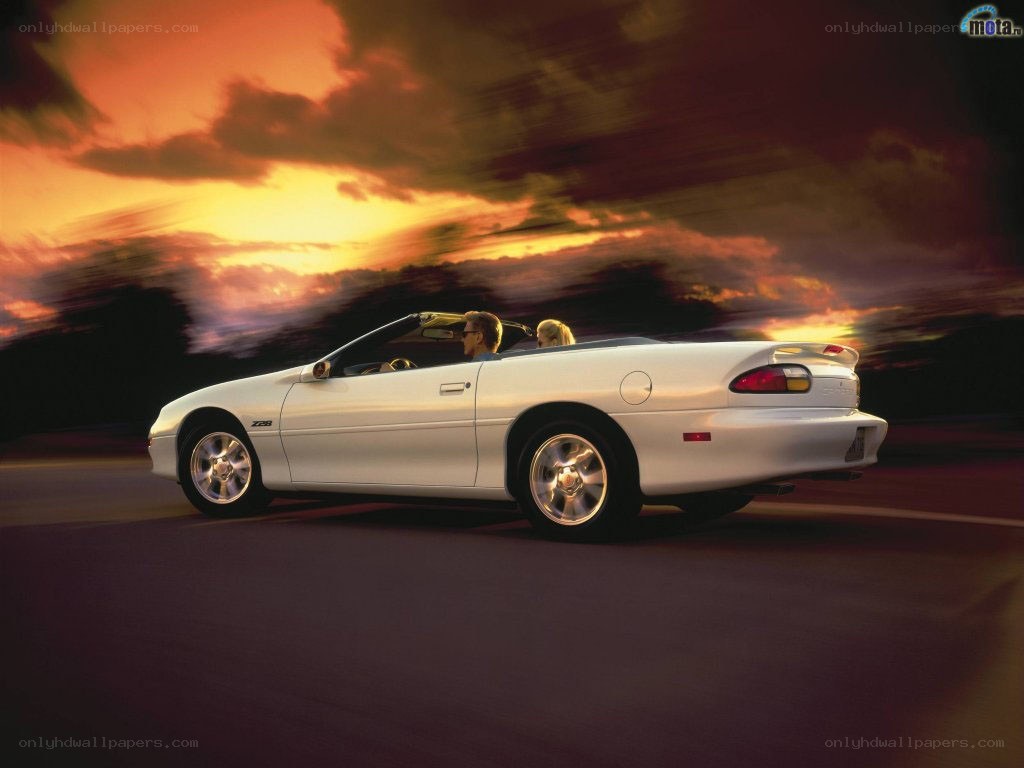 White convertible car at sunset