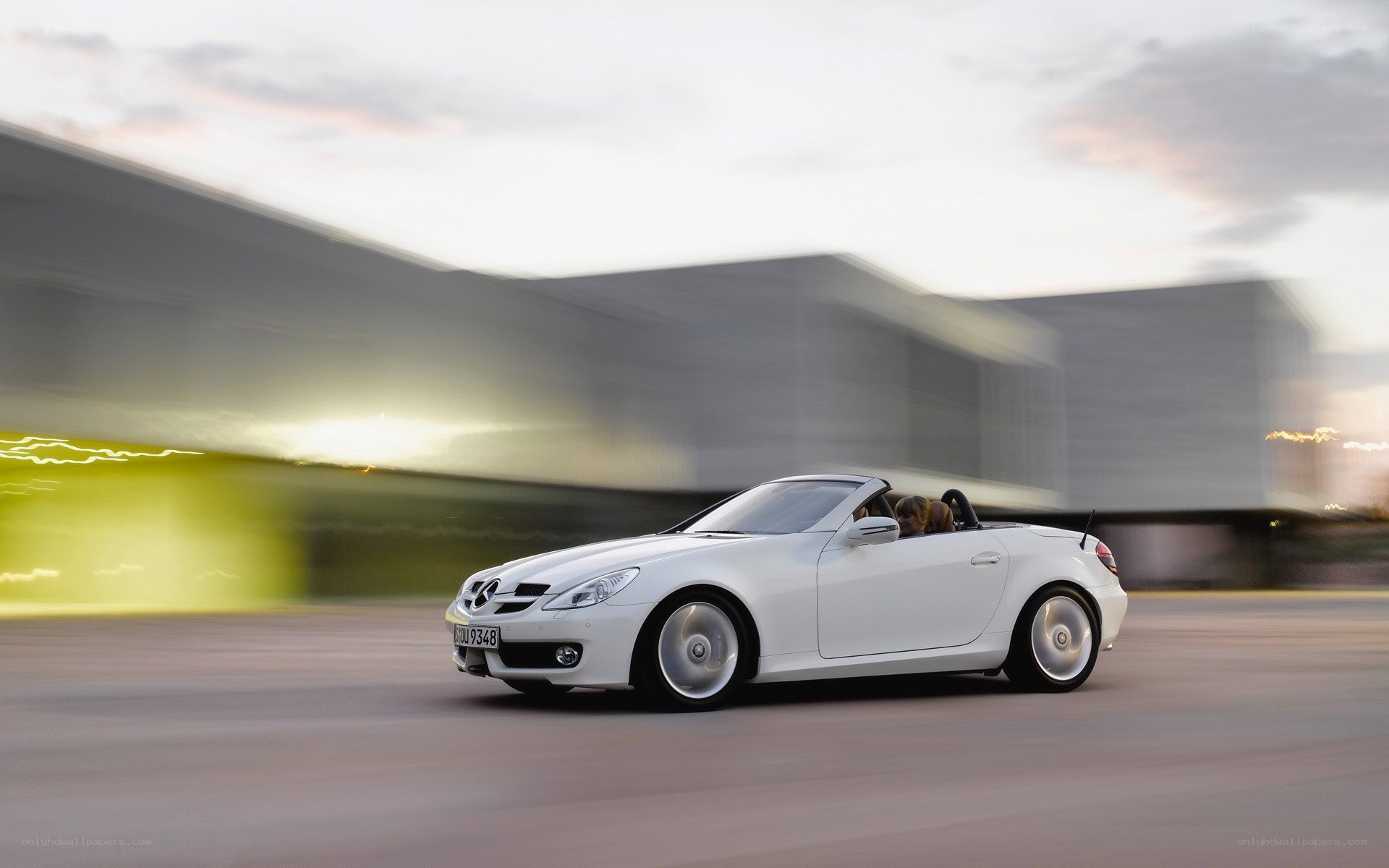 White convertible car in motion