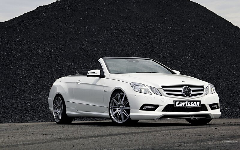 white convertible car on gravel