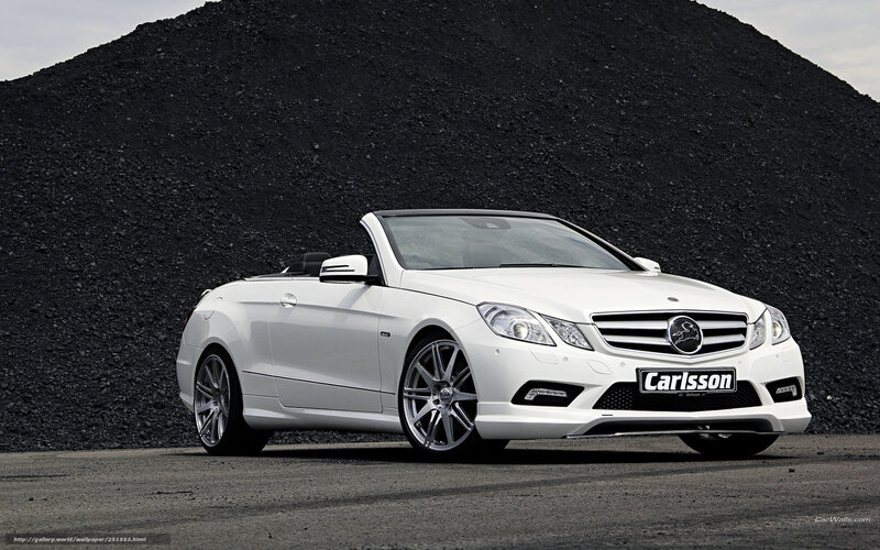 white convertible car on gravel