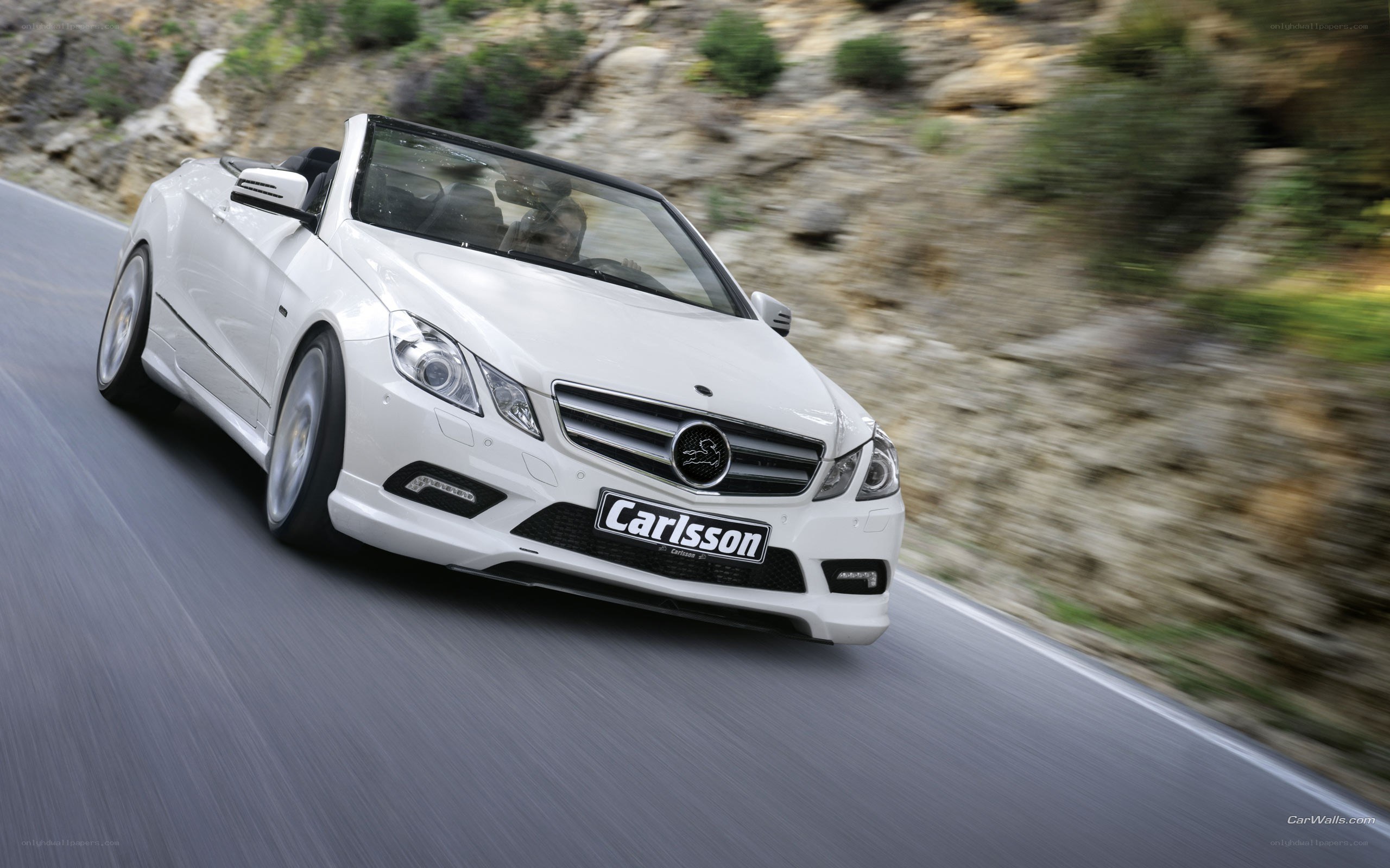 white convertible car on road