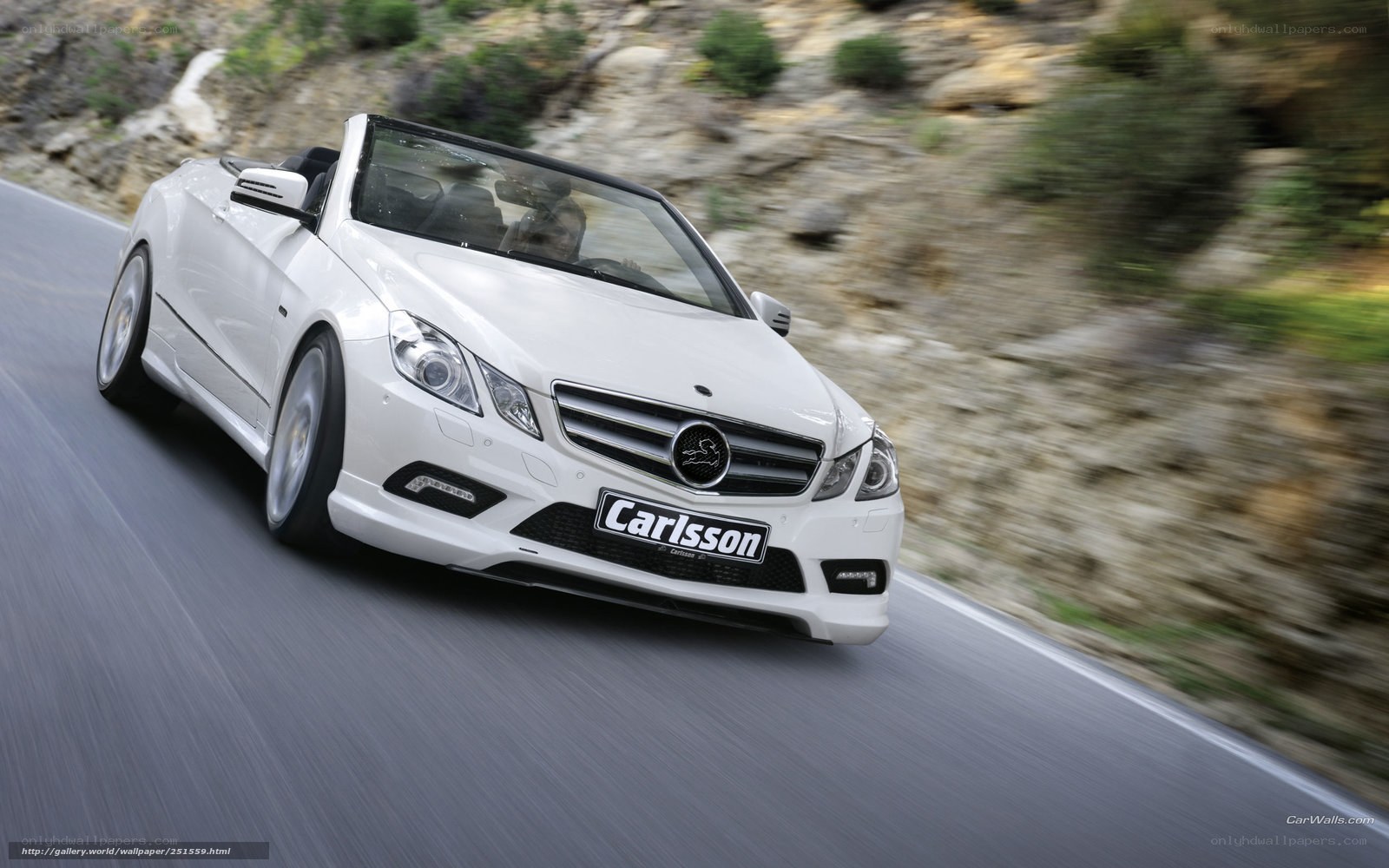 white convertible car on road