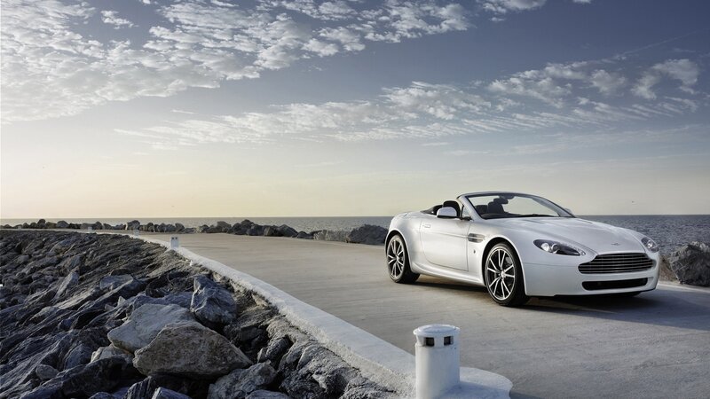 White Convertible Car — Serene, Sunset, Photograph, Sea, Rocks, Sky, Blue