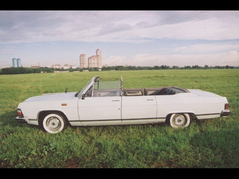White convertible in a field