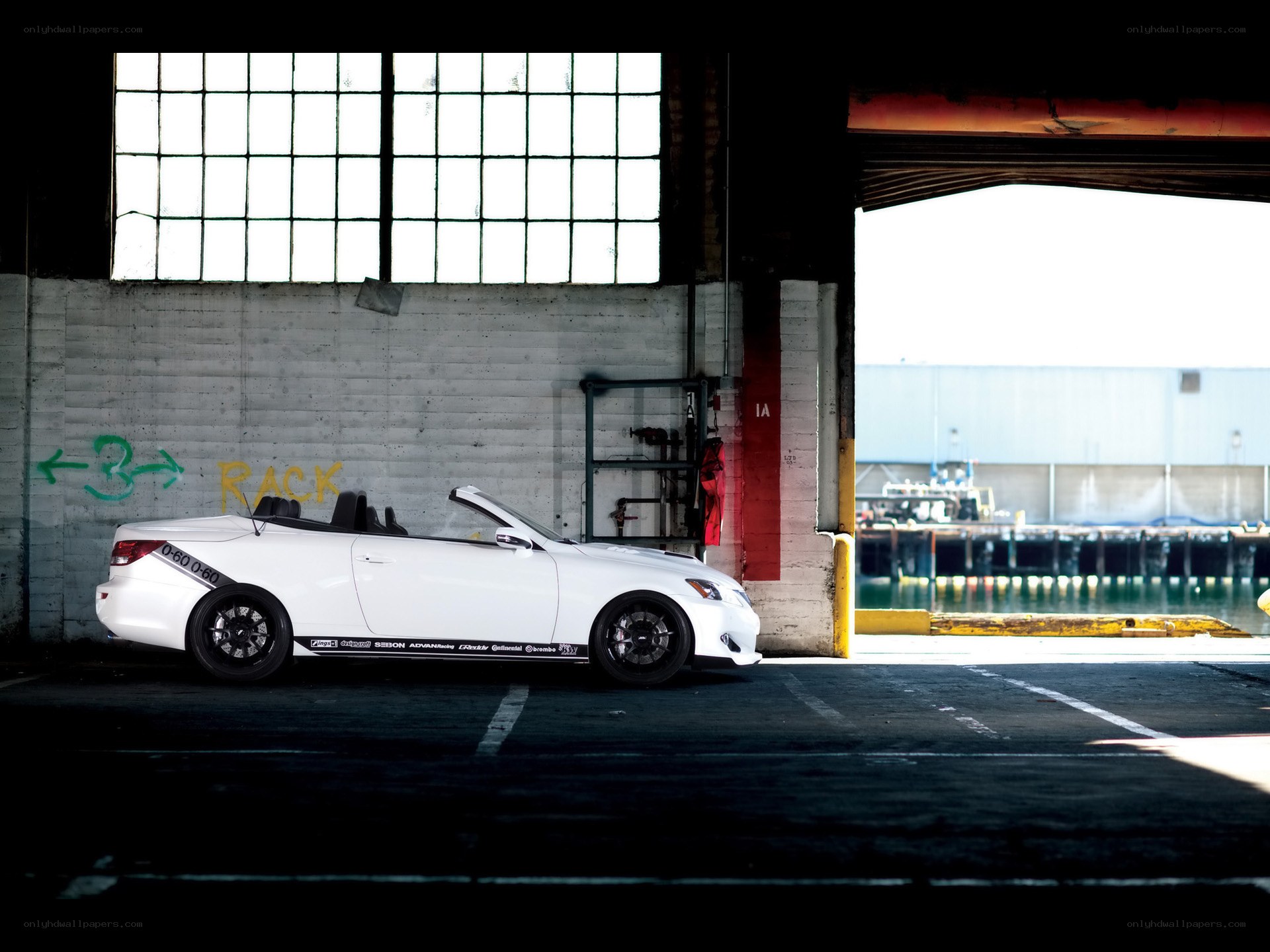 White convertible in a warehouse