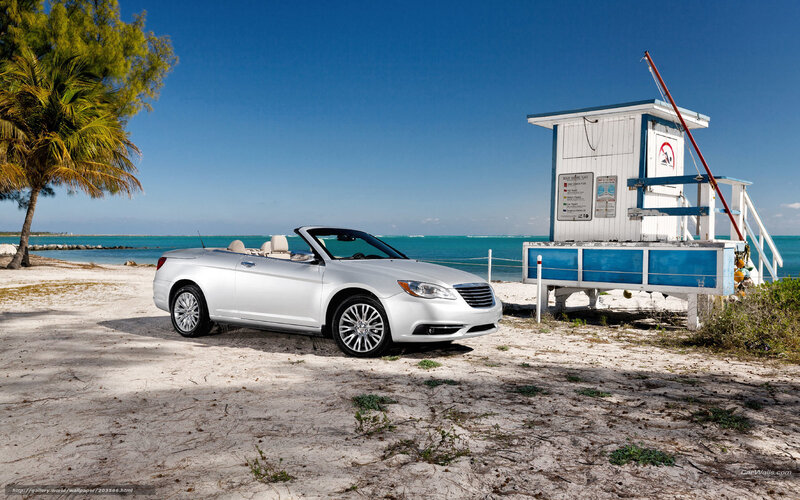 White convertible on beach