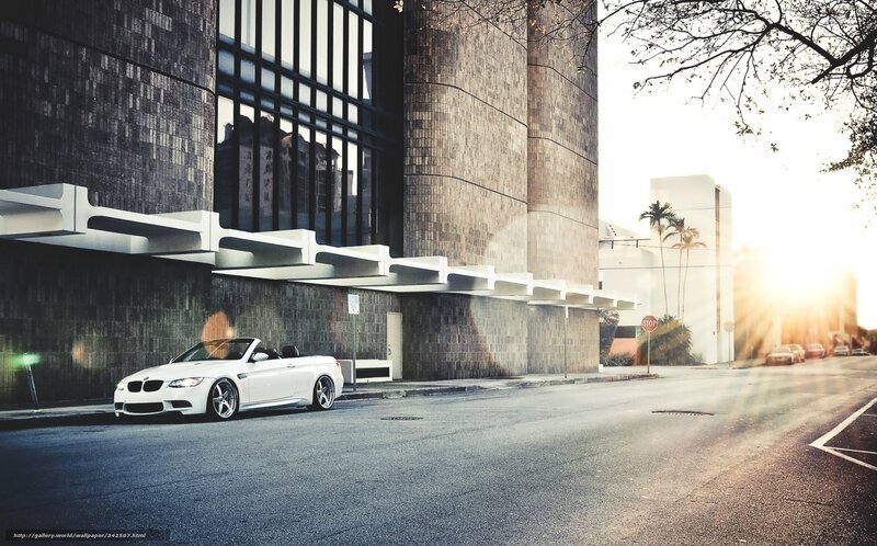 White convertible on city street