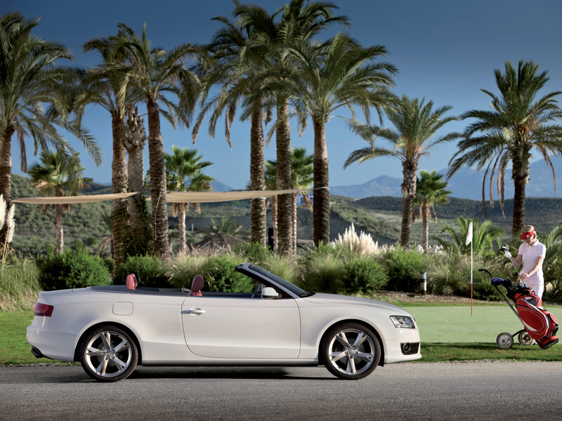 White convertible on golf course