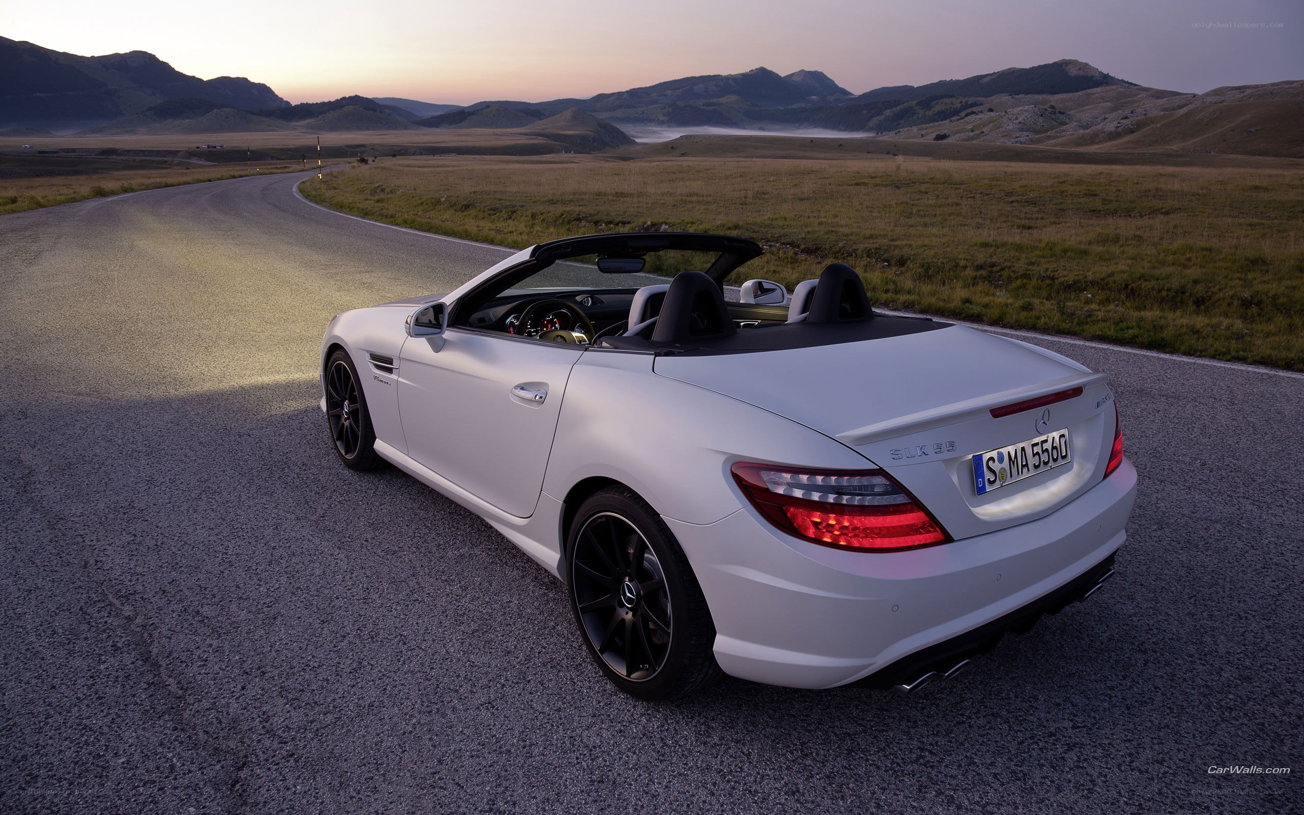 White convertible on mountain road