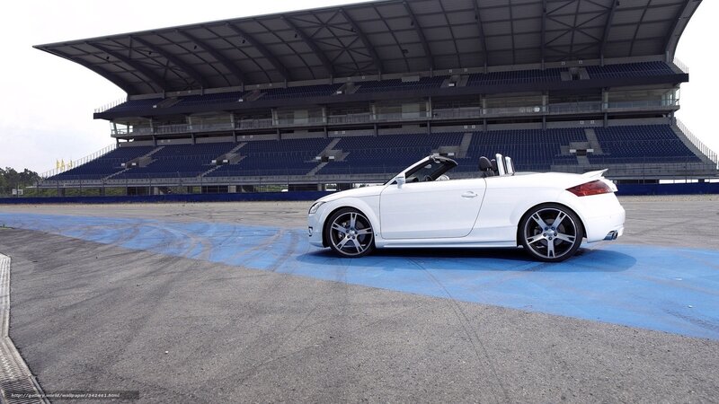 White convertible on racetrack