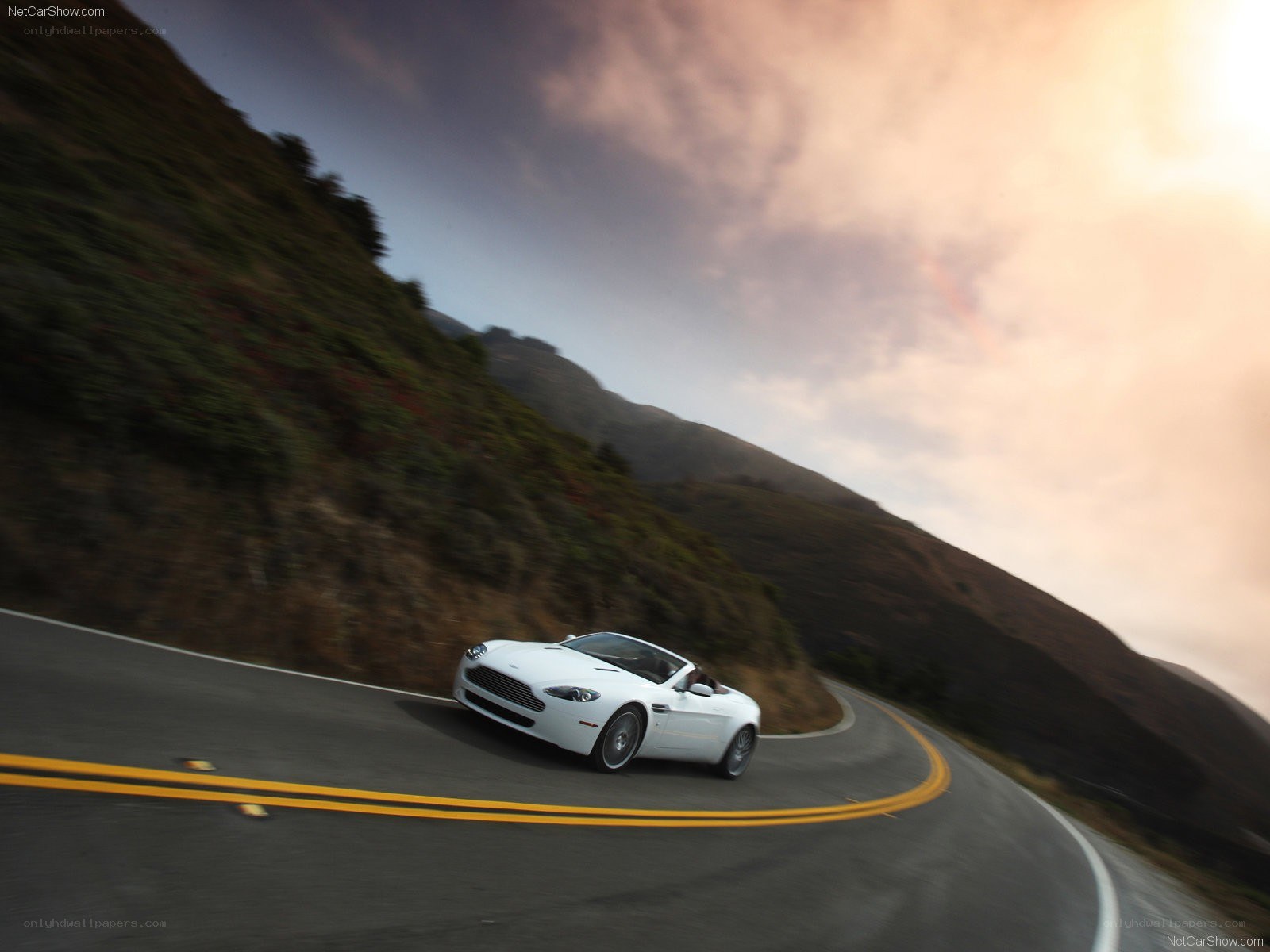 White convertible on winding road