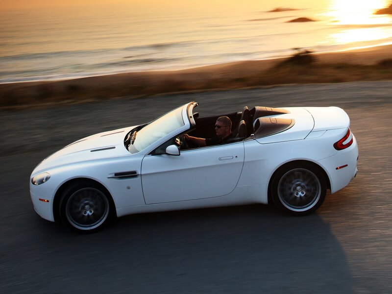 White convertible sports car at sunset