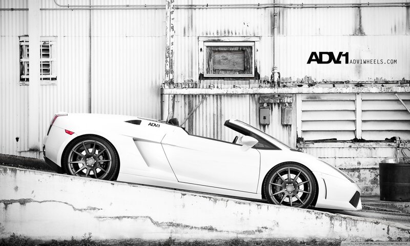 White Convertible Sports Car — Black