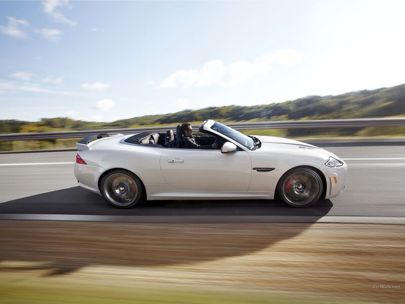 White convertible sports car driving