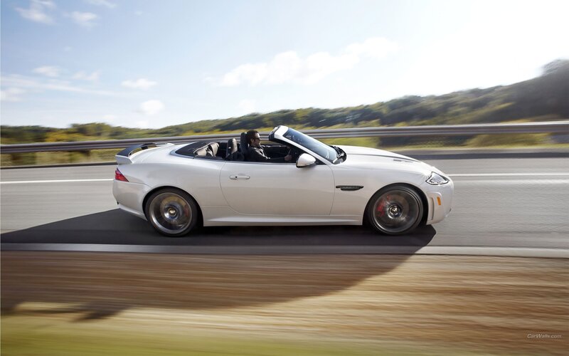 White convertible sports car on road